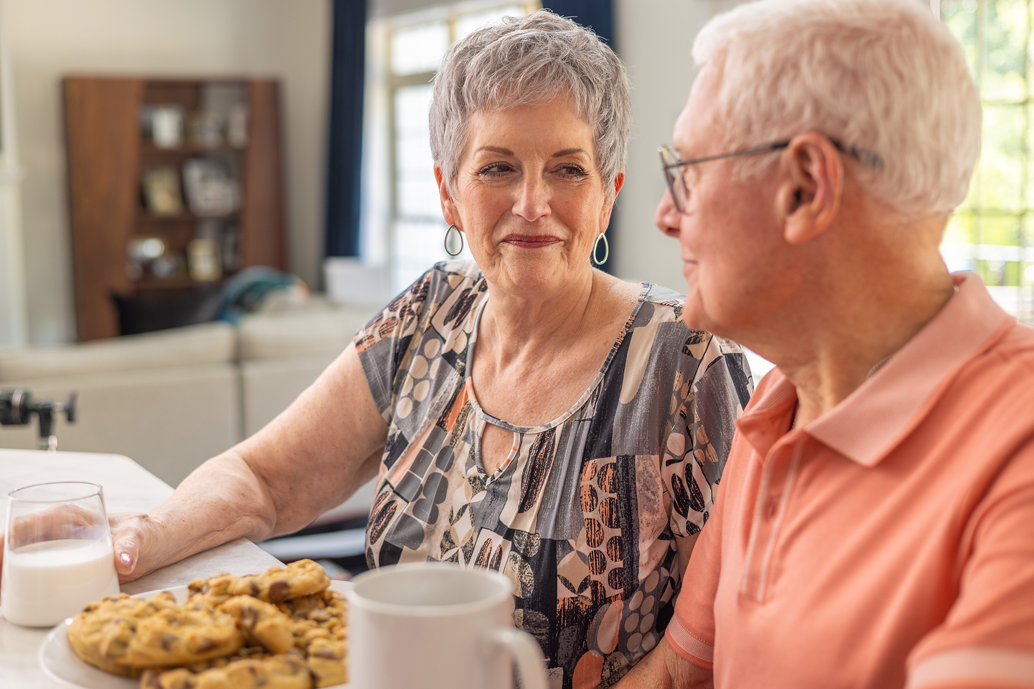 Margaret YESCARTA® (axicabtagene ciloleucel) patient ambassador sitting with caregiver Skip.